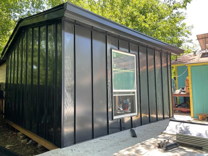 Black standing seam metal wall panels for Roof Inspection in Pimmit Hills