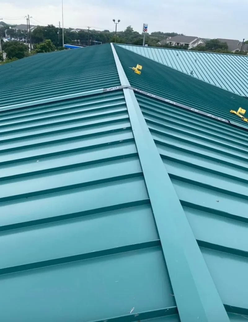 Green commercial metal roof ridge and valley for Metal Roof Repair in Pimmit Hills